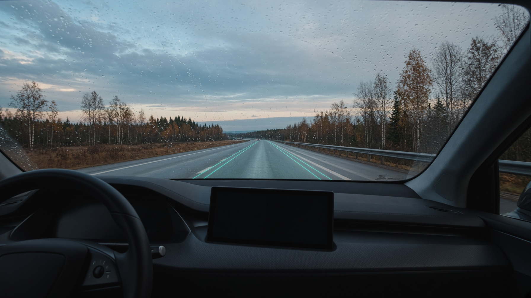 Passenger view of a Tesla on a Nordic motorway with driver-assist overlay